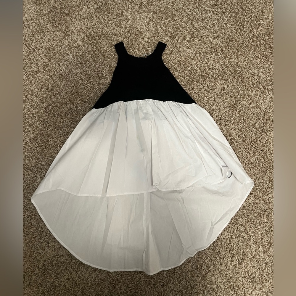 High/low top with high neck. By English Factory size small.